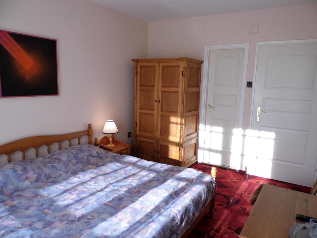 Postel nebo postele na pokoji v ubytování Millennium Villa