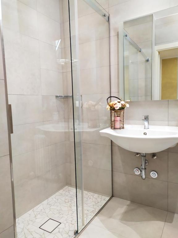 Koupelna v ubytování Hotel Ambrosiana
