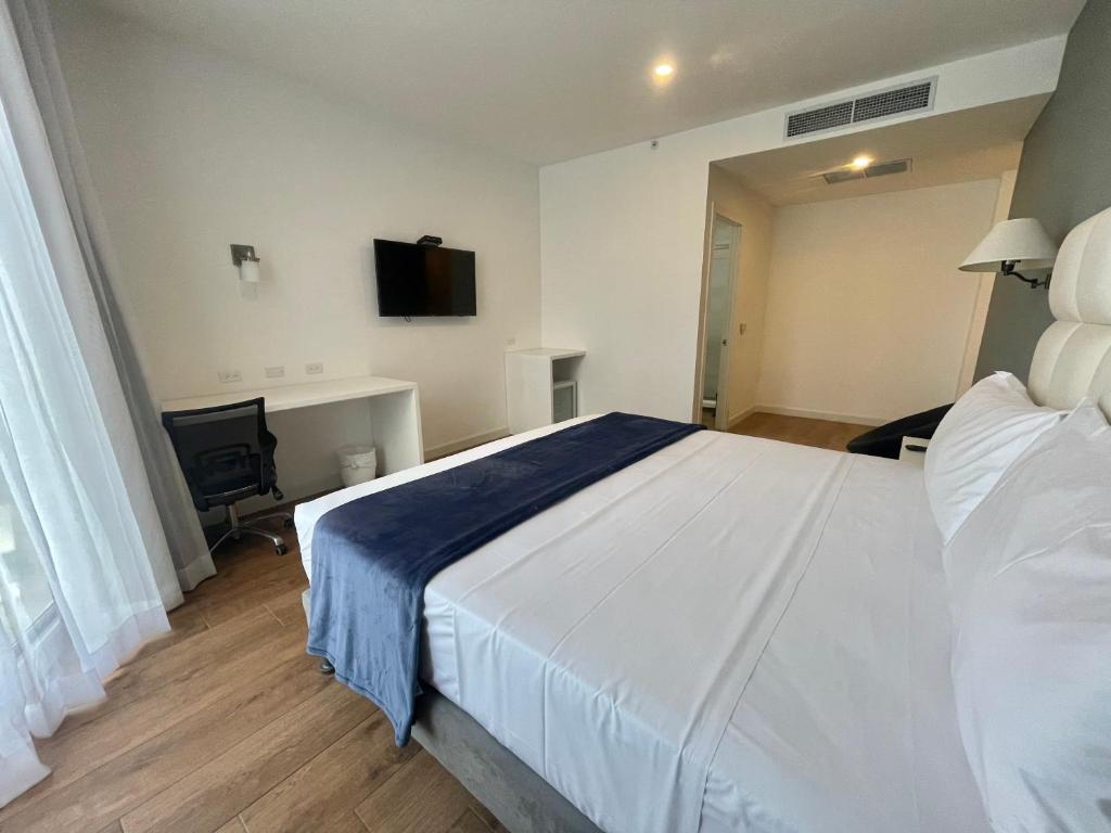 Postel nebo postele na pokoji v ubytování Hotel Mio Panamá