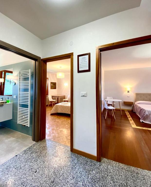 Postel nebo postele na pokoji v ubytování Casa Ortensia