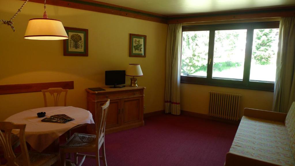 Telewizja i/lub zestaw kina domowego w obiekcie RTA Hotel Catturani