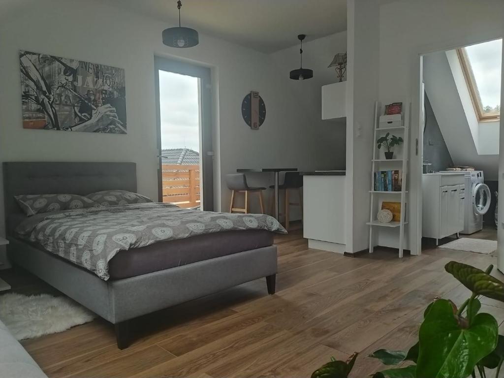 Postel nebo postele na pokoji v ubytování Apartament Muzyczny