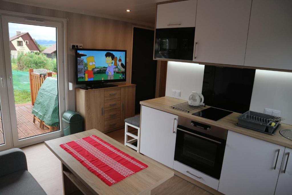 Kuchyň nebo kuchyňský kout v ubytování Amis apartmán 2