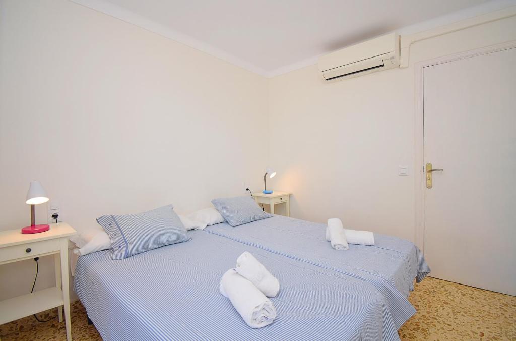 Postel nebo postele na pokoji v ubytování 134 Apartamento Pins-Tugores by Mallorca Charme