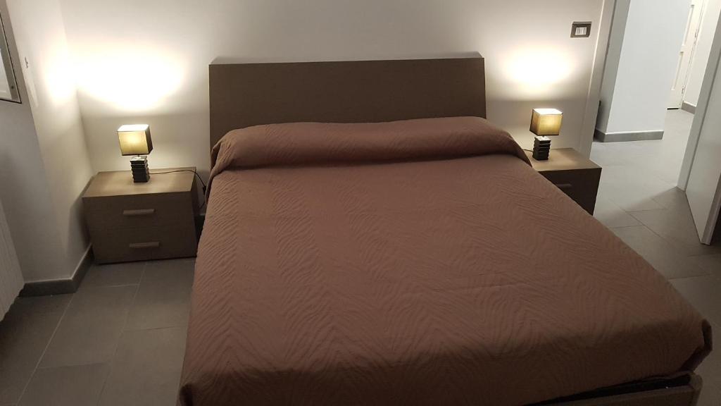 מיטה או מיטות בחדר ב-Casa Mazzotta
