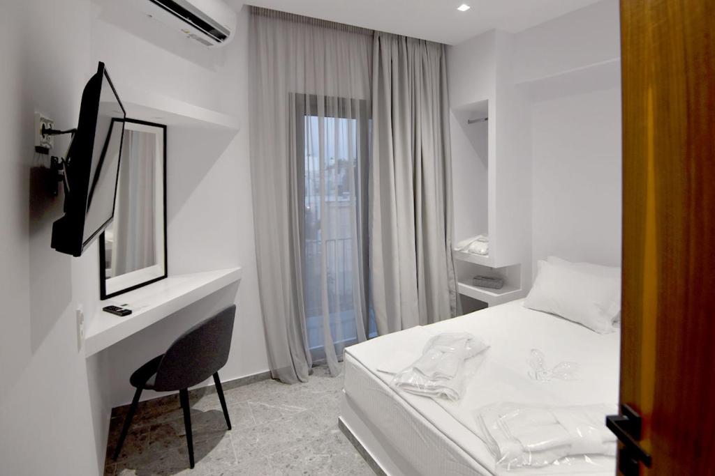 Giường trong phòng chung tại Rose n Stone, Prince, Luxury Houses