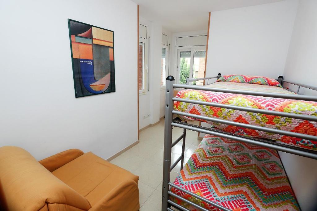 Posteľ alebo postele v izbe v ubytovaní Apartamento Plaça Jardí