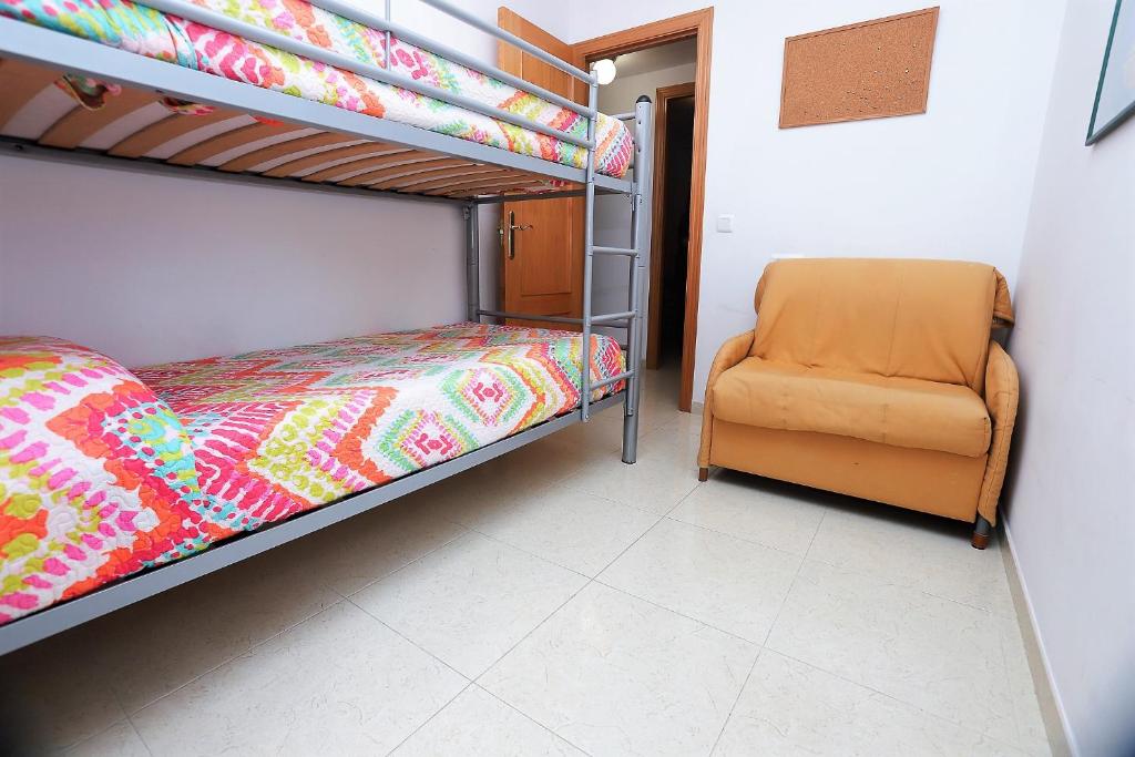 Posteľ alebo postele v izbe v ubytovaní Apartamento Plaça Jardí