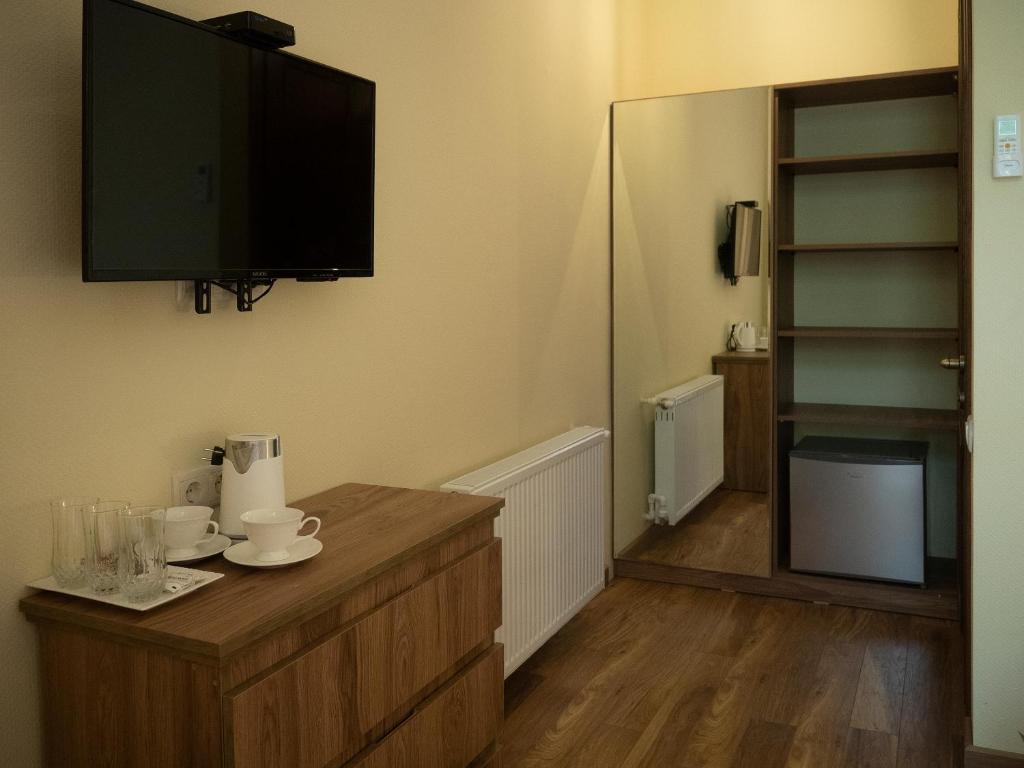 TV a/nebo společenská místnost v ubytování Boutique Hotel Filosofia