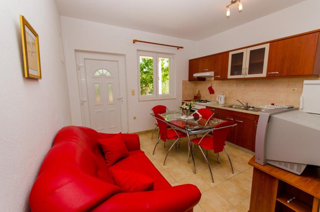 Kuchyň nebo kuchyňský kout v ubytování Apartments Ivana