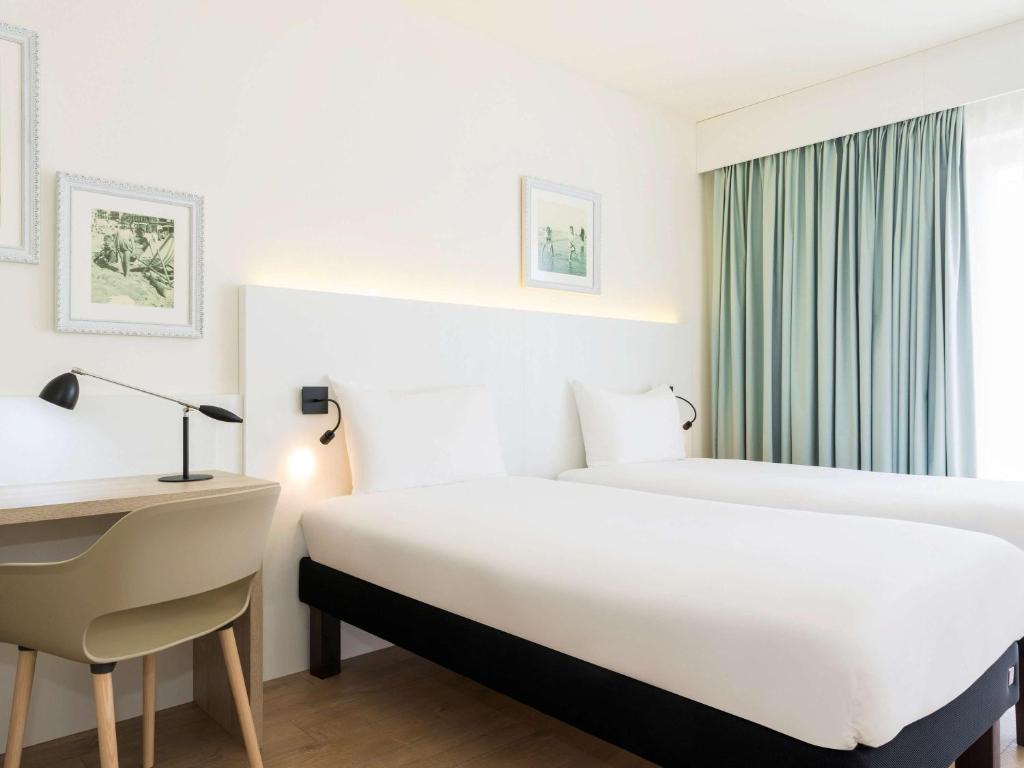 Postel nebo postele na pokoji v ubytování ibis Styles Nieuwpoort
