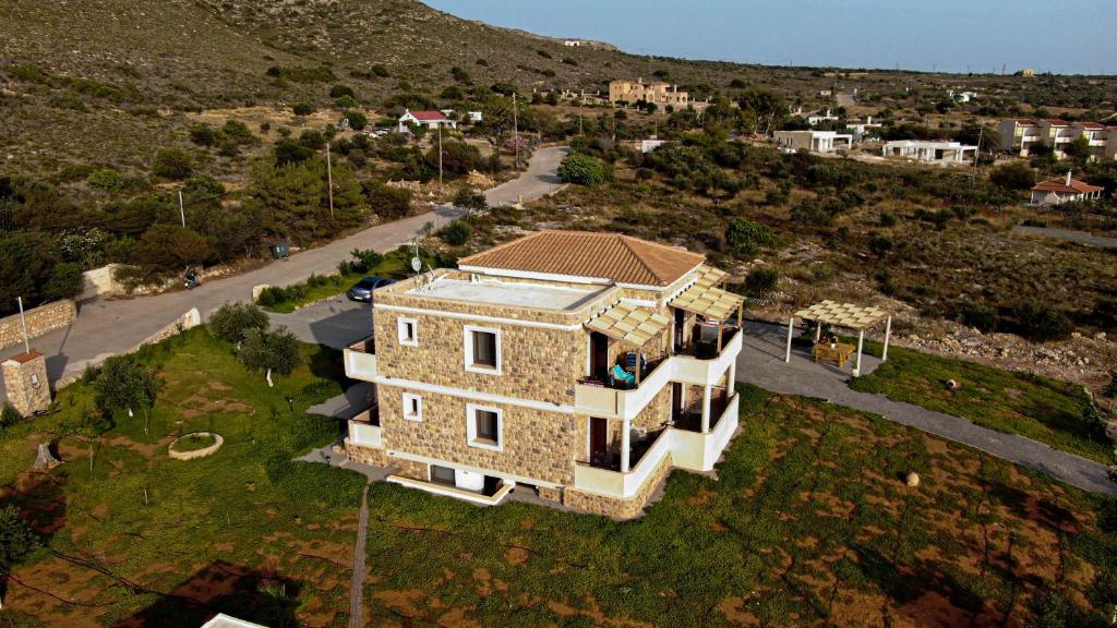 an aerial view of a house in a field at Castro Elafonisos in Elafonisos