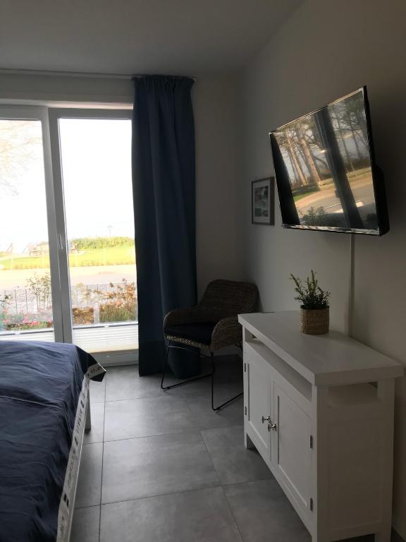 TV a/nebo společenská místnost v ubytování OceanView