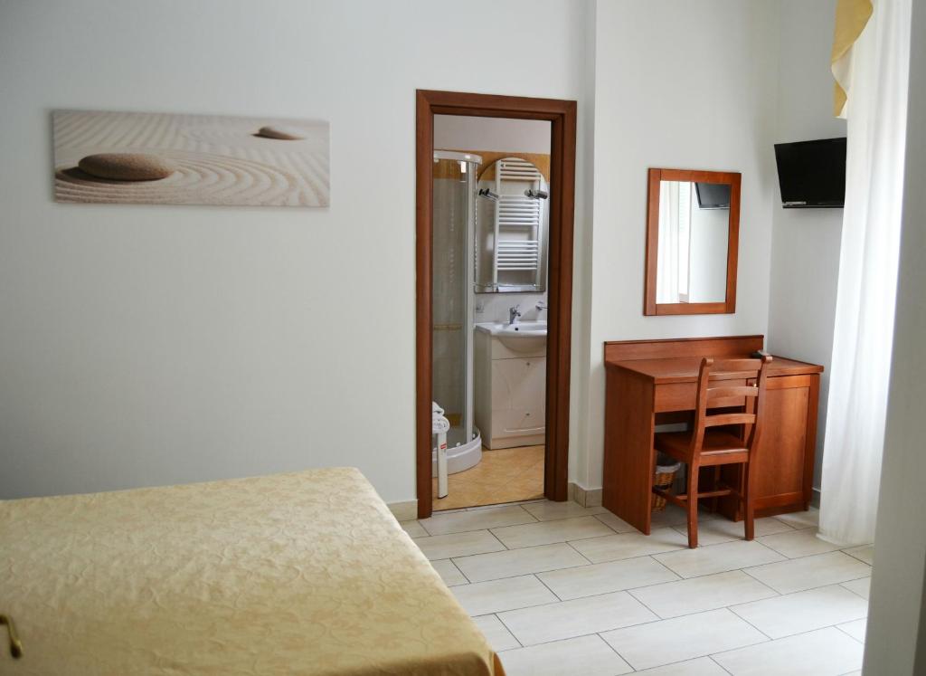 Postel nebo postele na pokoji v ubytování B&B Centrale Affittacamere