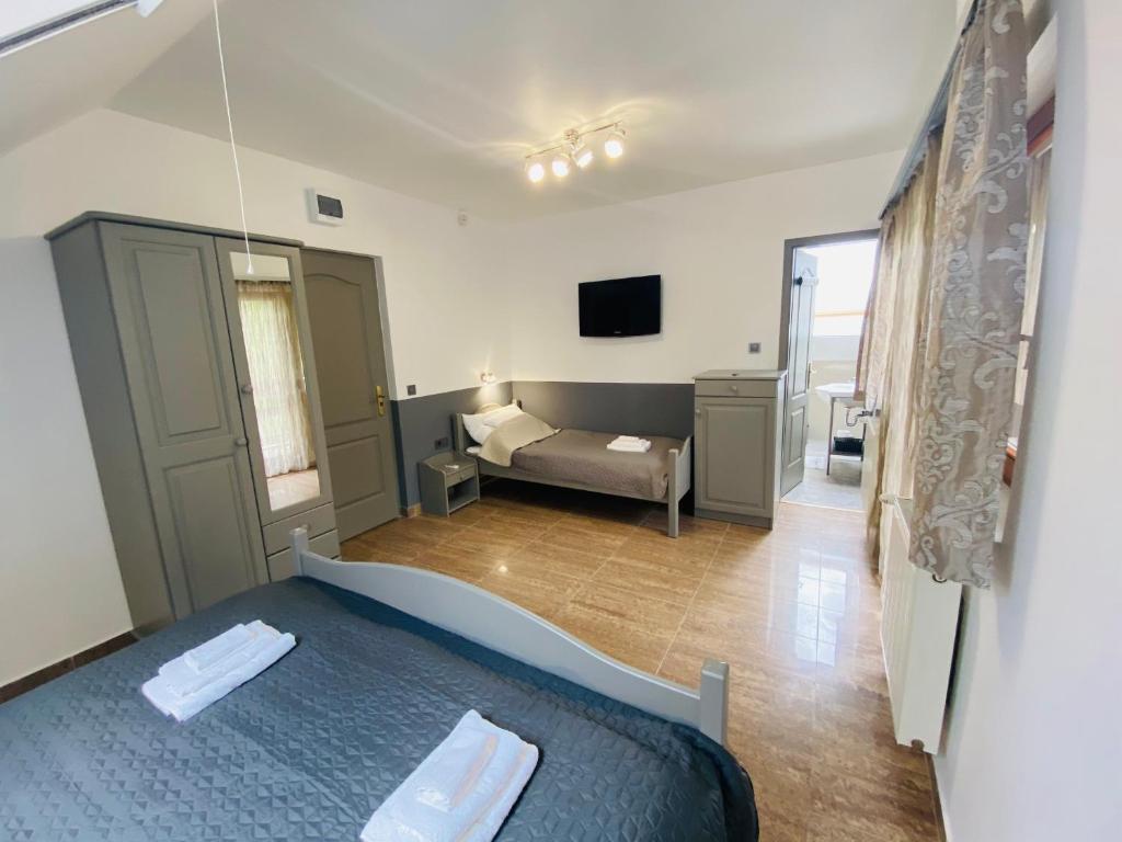 Postel nebo postele na pokoji v ubytování Linton Apartmanház