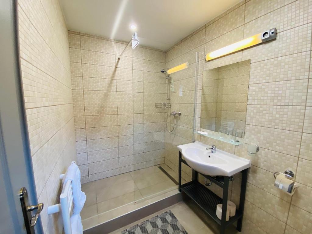 Koupelna v ubytování Linton Apartmanház