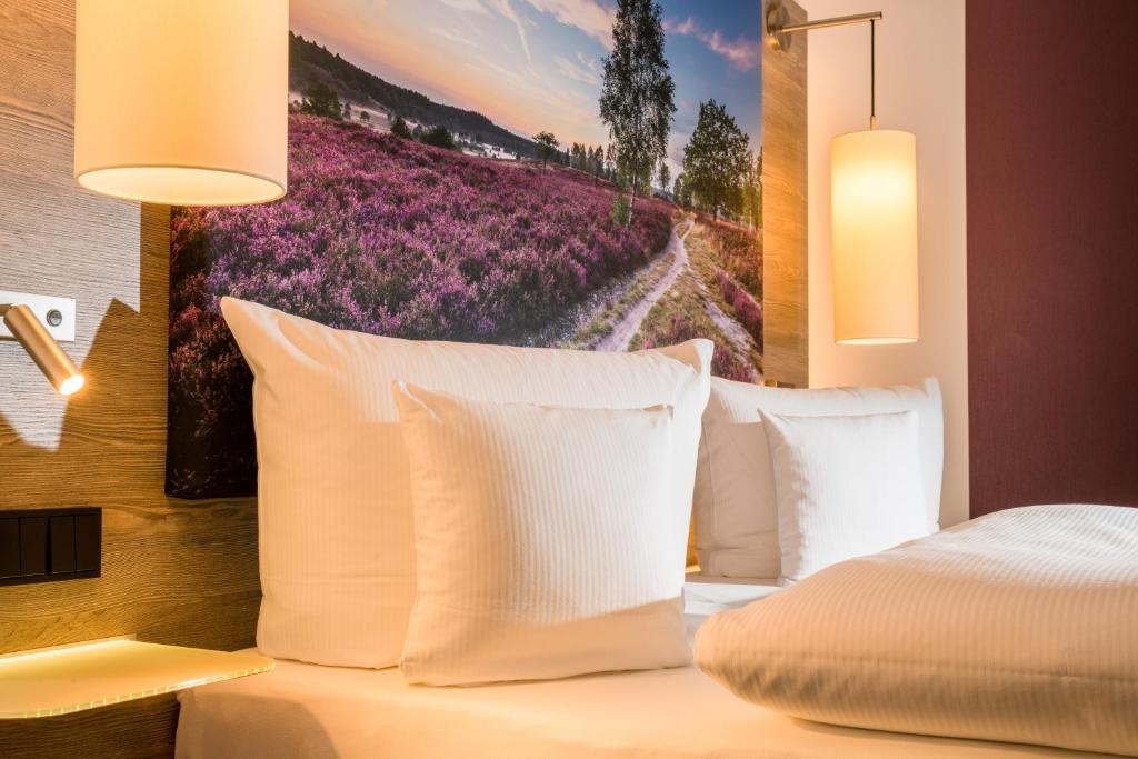 Postel nebo postele na pokoji v ubytování Hotel Celler Tor