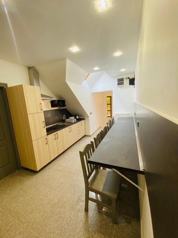 Kuchyň nebo kuchyňský kout v ubytování Linton Apartmanház
