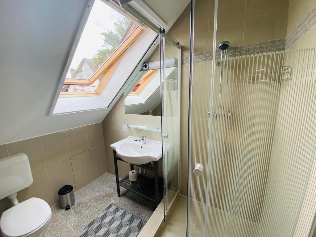 Koupelna v ubytování Linton Apartmanház