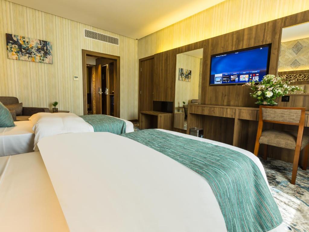 TV a/nebo společenská místnost v ubytování Wow Diamond - White Diamond Hotel Al Nuzha