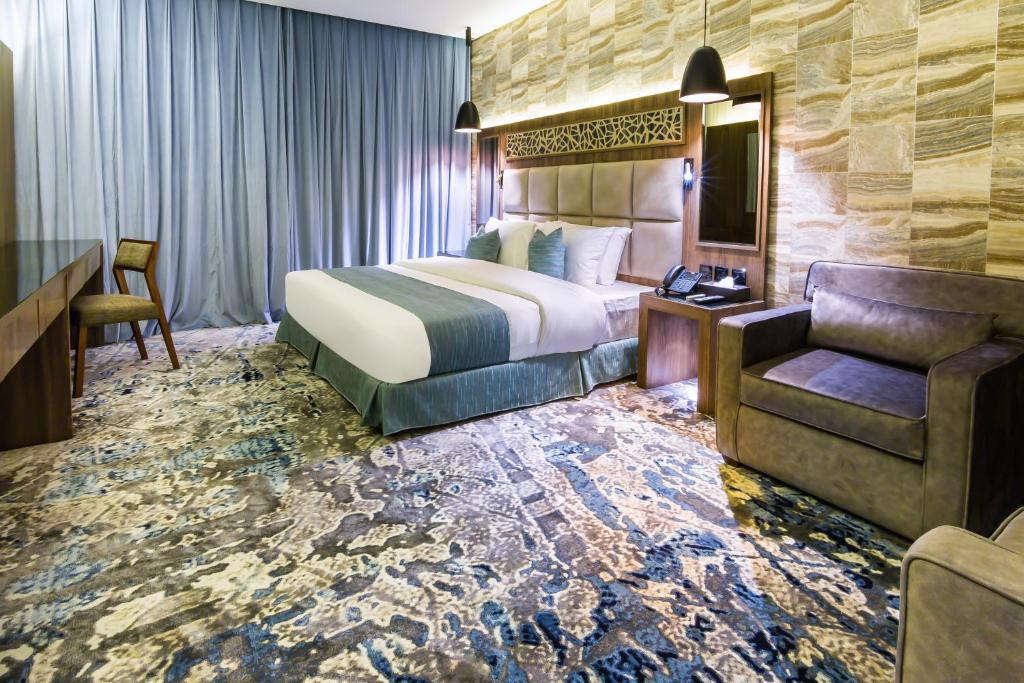 Postel nebo postele na pokoji v ubytování Wow Diamond - White Diamond Hotel Al Nuzha