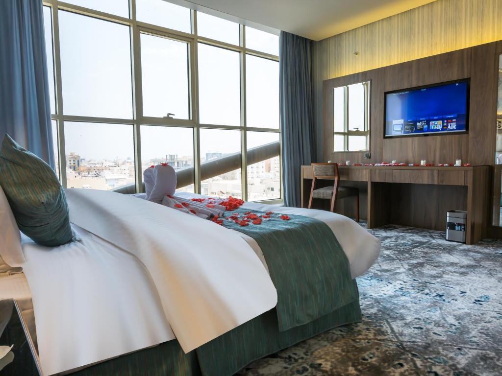Postel nebo postele na pokoji v ubytování Wow Diamond - White Diamond Hotel Al Nuzha