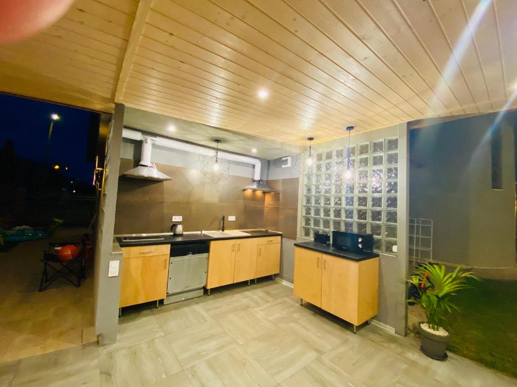 Kuchyň nebo kuchyňský kout v ubytování Linton Apartmanház