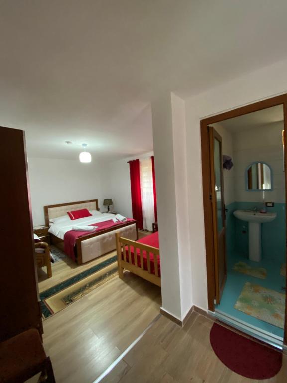 Letto o letti in una camera di Guesthouse Mehmeti