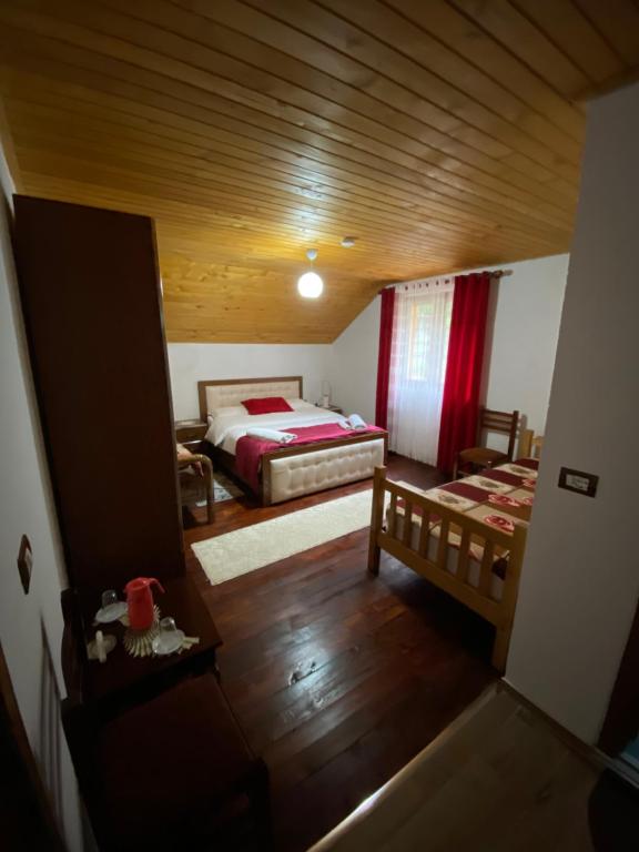 Letto o letti in una camera di Guesthouse Mehmeti