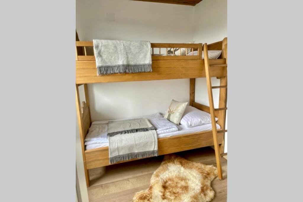 Postel nebo postele na pokoji v ubytování Almhaus-Klippitz