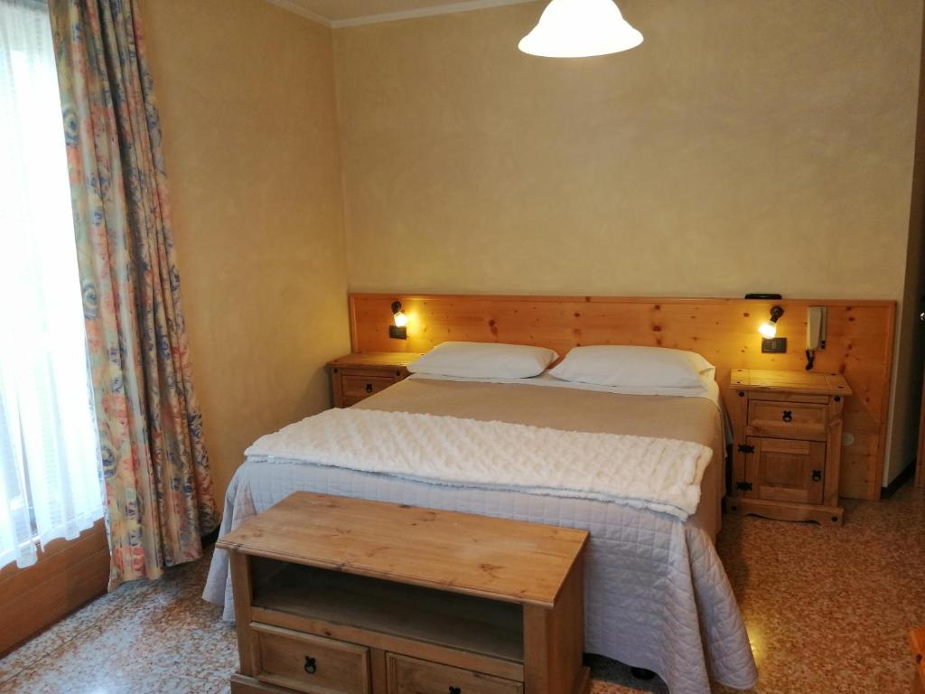 Letto o letti in una camera di Hotel Zebrù