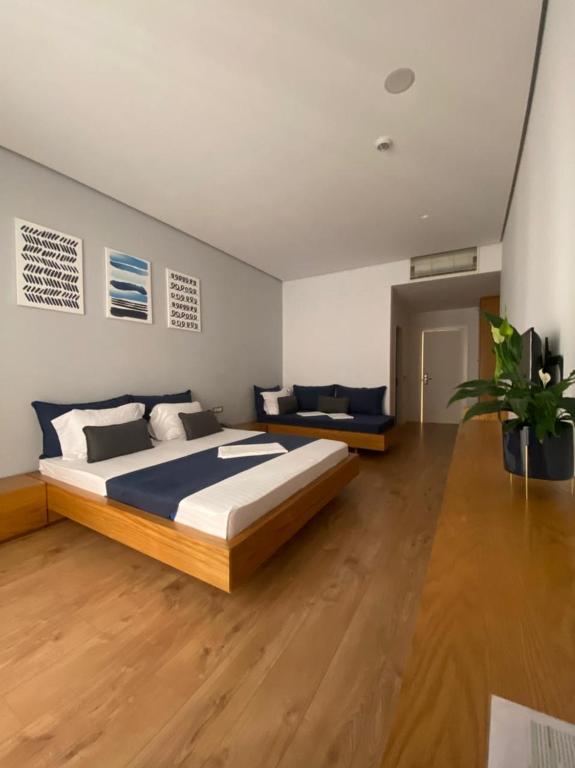 Postel nebo postele na pokoji v ubytování H&M Hotel