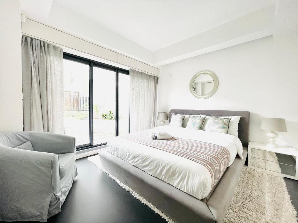 Säng eller sängar i ett rum på Terrace Saldanha Apartment