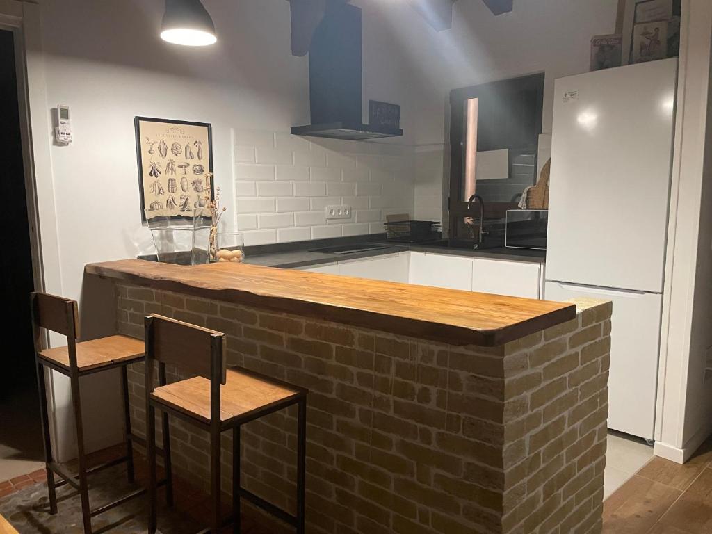 Kuchyň nebo kuchyňský kout v ubytování Vivienda uso Turístico Buscando Lino Sotosalbos