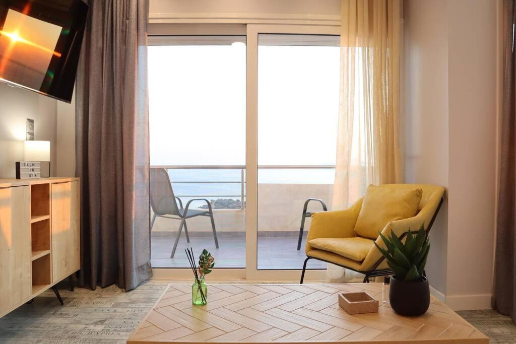 A seating area at 360° View Suites Cos