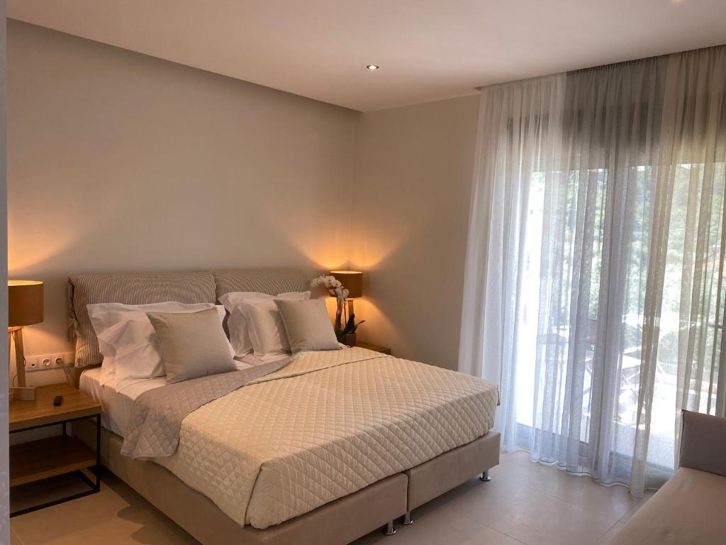 Postel nebo postele na pokoji v ubytování Luminous Luxury Apartments