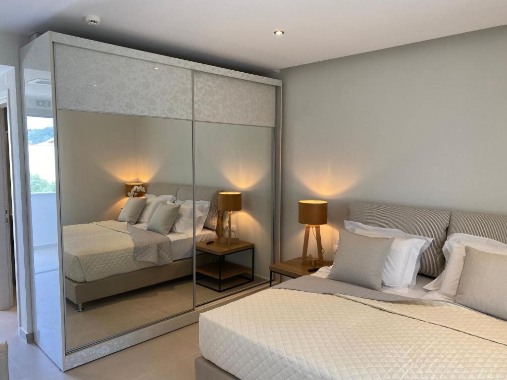 Postel nebo postele na pokoji v ubytování Luminous Luxury Apartments