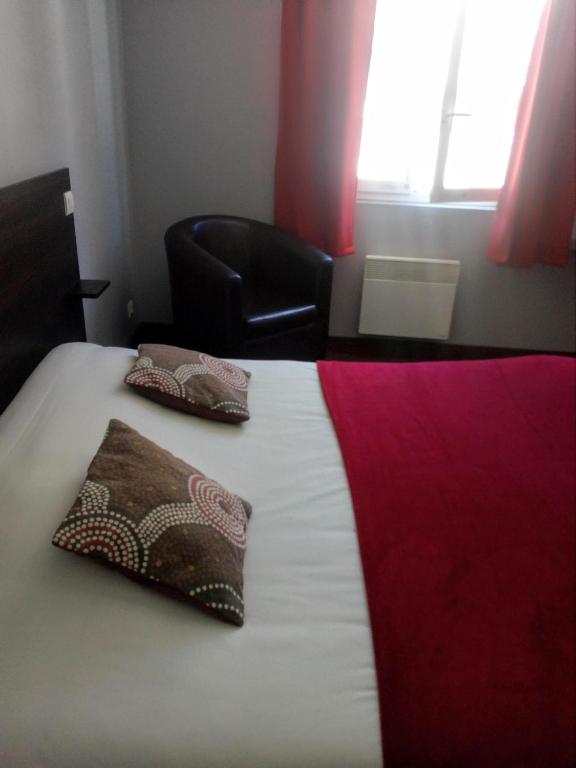 Postel nebo postele na pokoji v ubytování Auberge de Barnas