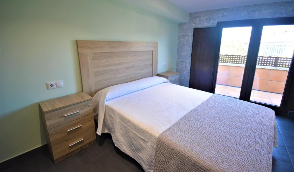 Posteľ alebo postele v izbe v ubytovaní Apartamento con terraza en Cambados