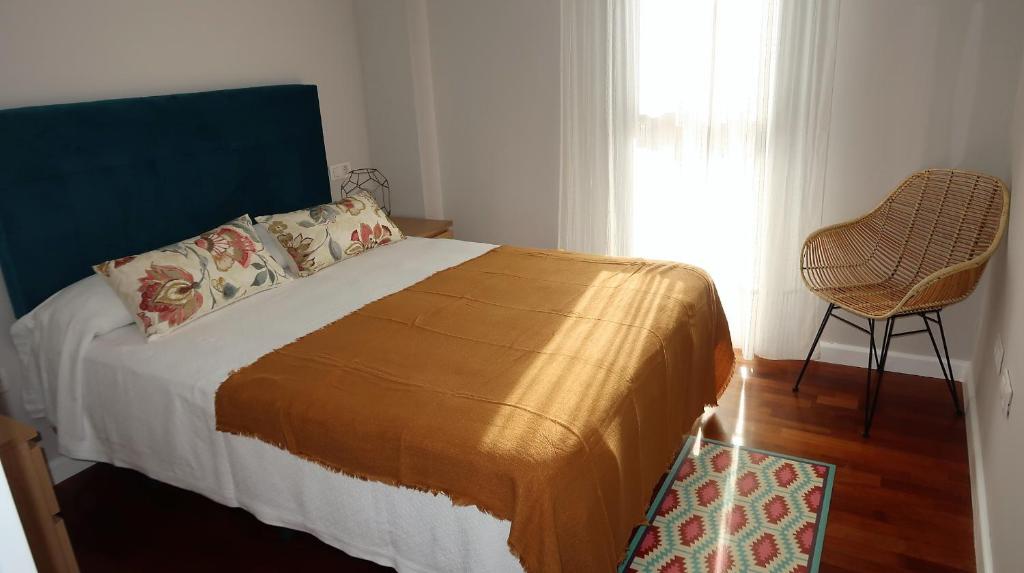 Postel nebo postele na pokoji v ubytování Sevilla SantaJusta PG Apartamentos