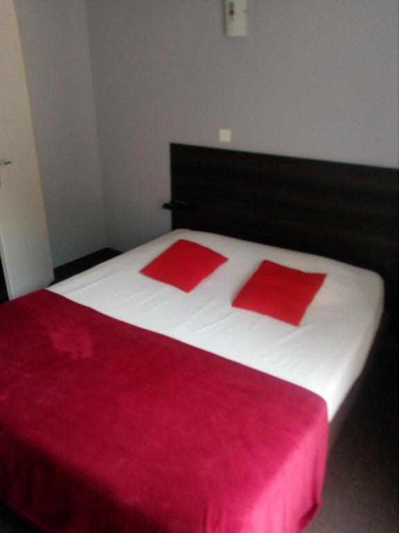 Postel nebo postele na pokoji v ubytování Auberge de Barnas
