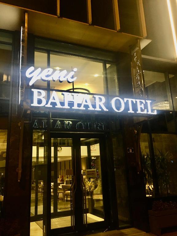 a sign on the front of a restaurant at Yeni Bahar Otel in Ankara