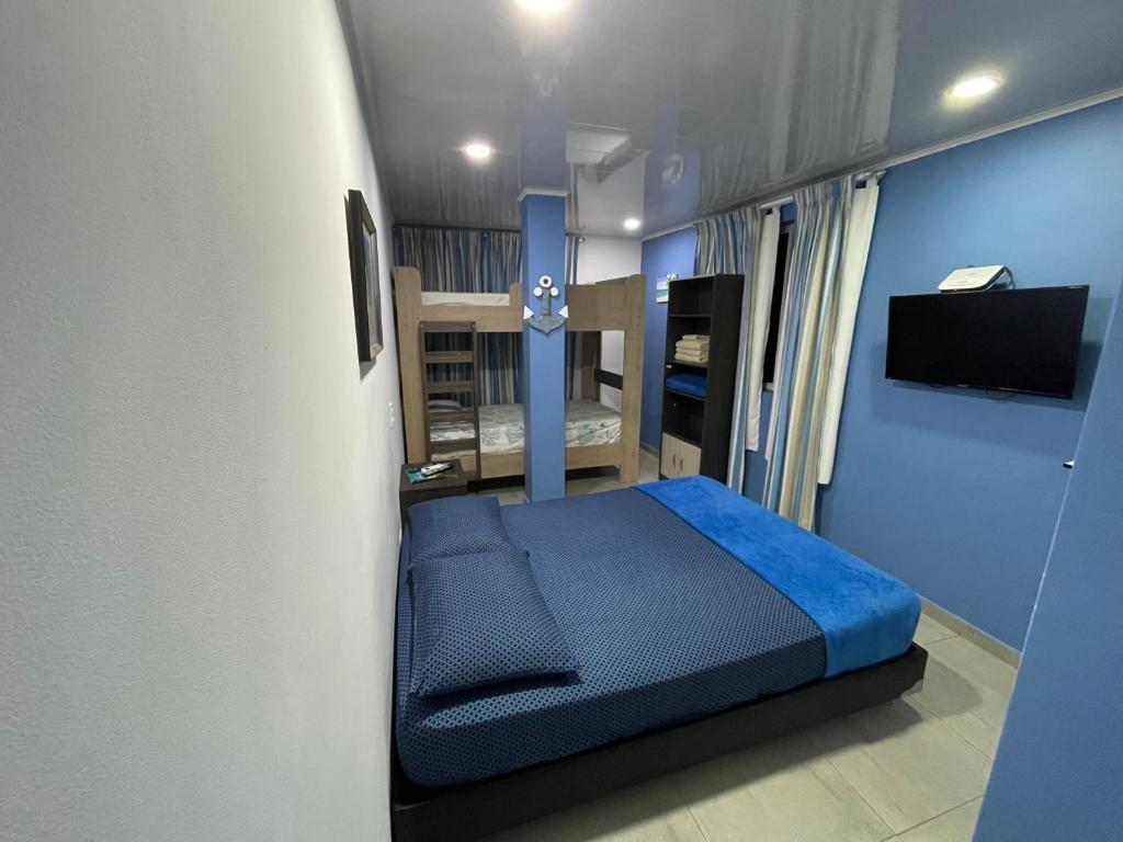 Postel nebo postele na pokoji v ubytování Palmare House