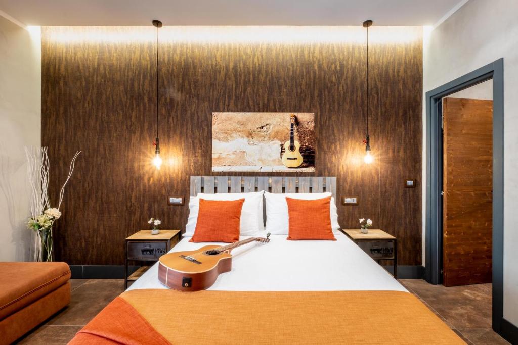 Postel nebo postele na pokoji v ubytování casajammone naples b&b