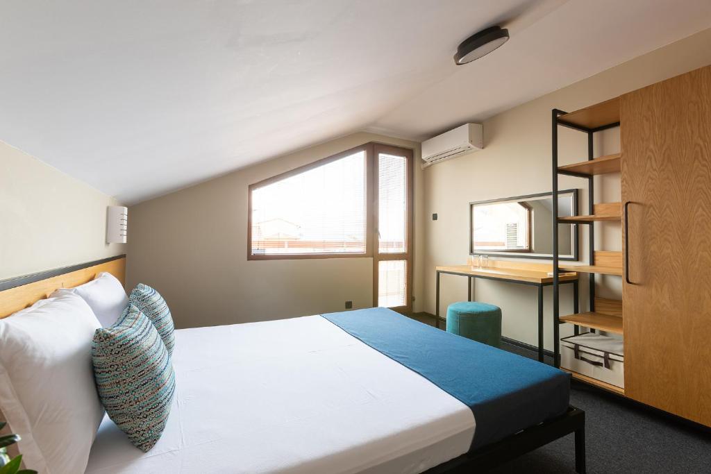 Postel nebo postele na pokoji v ubytování Hotel Albatros New Town