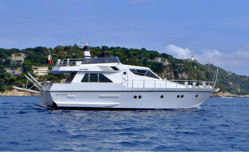 a white boat sitting in the water on the water at Yacht Charter Nice Cannes Antibes in Nice