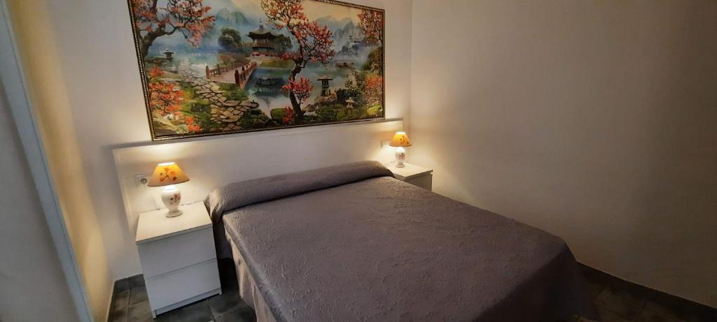 Кровать или кровати в номере Hotel Maravillas del Mundo