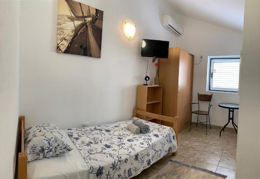 Letto o letti in una camera di Zvezda Meljine