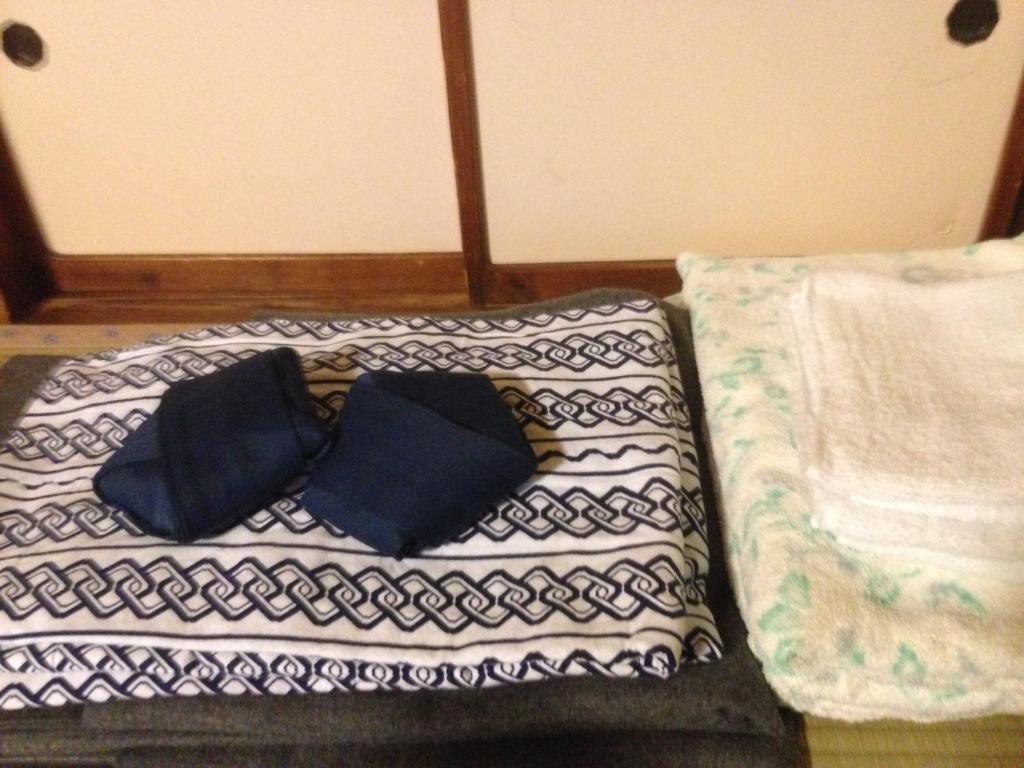 中央館　清水屋旅館にあるベッド