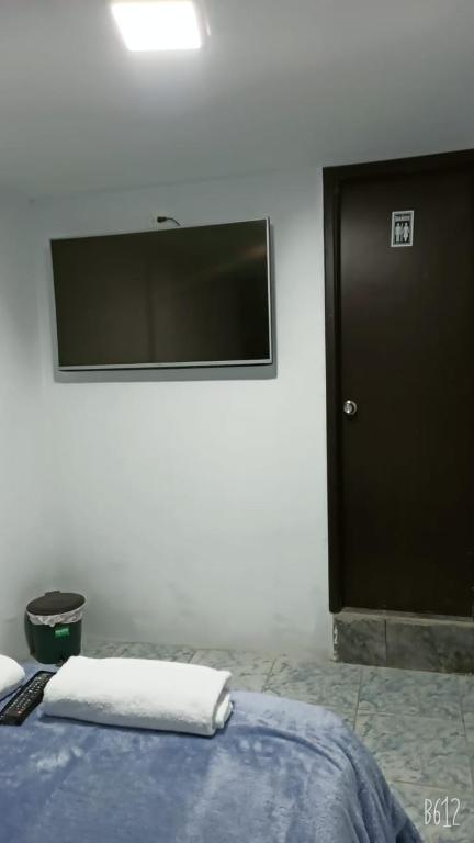 Postel nebo postele na pokoji v ubytování Hostal Da`Silva